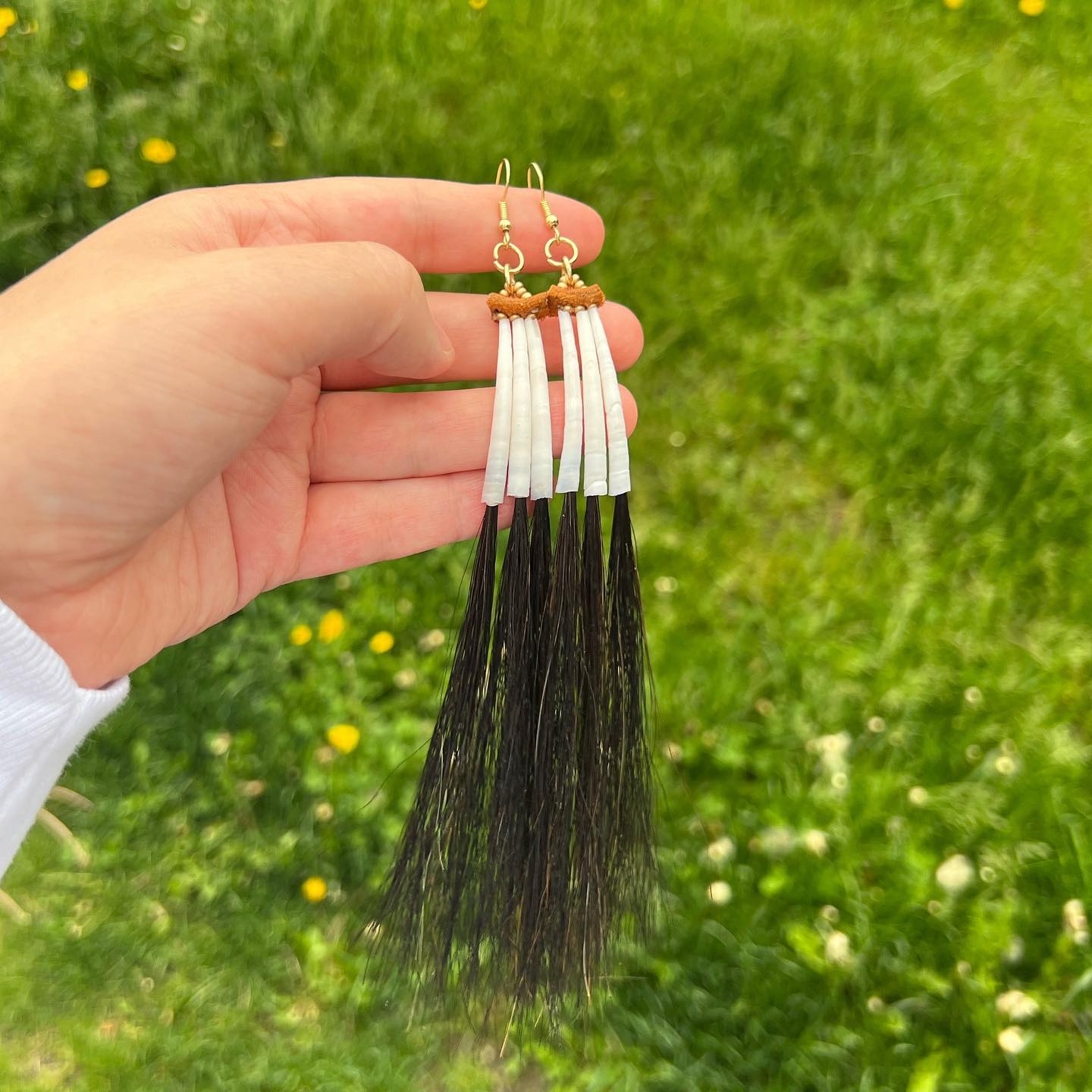 These beauties sold before I could even post them. Single tier of triple dentalium with horse hair. Brass finishings.